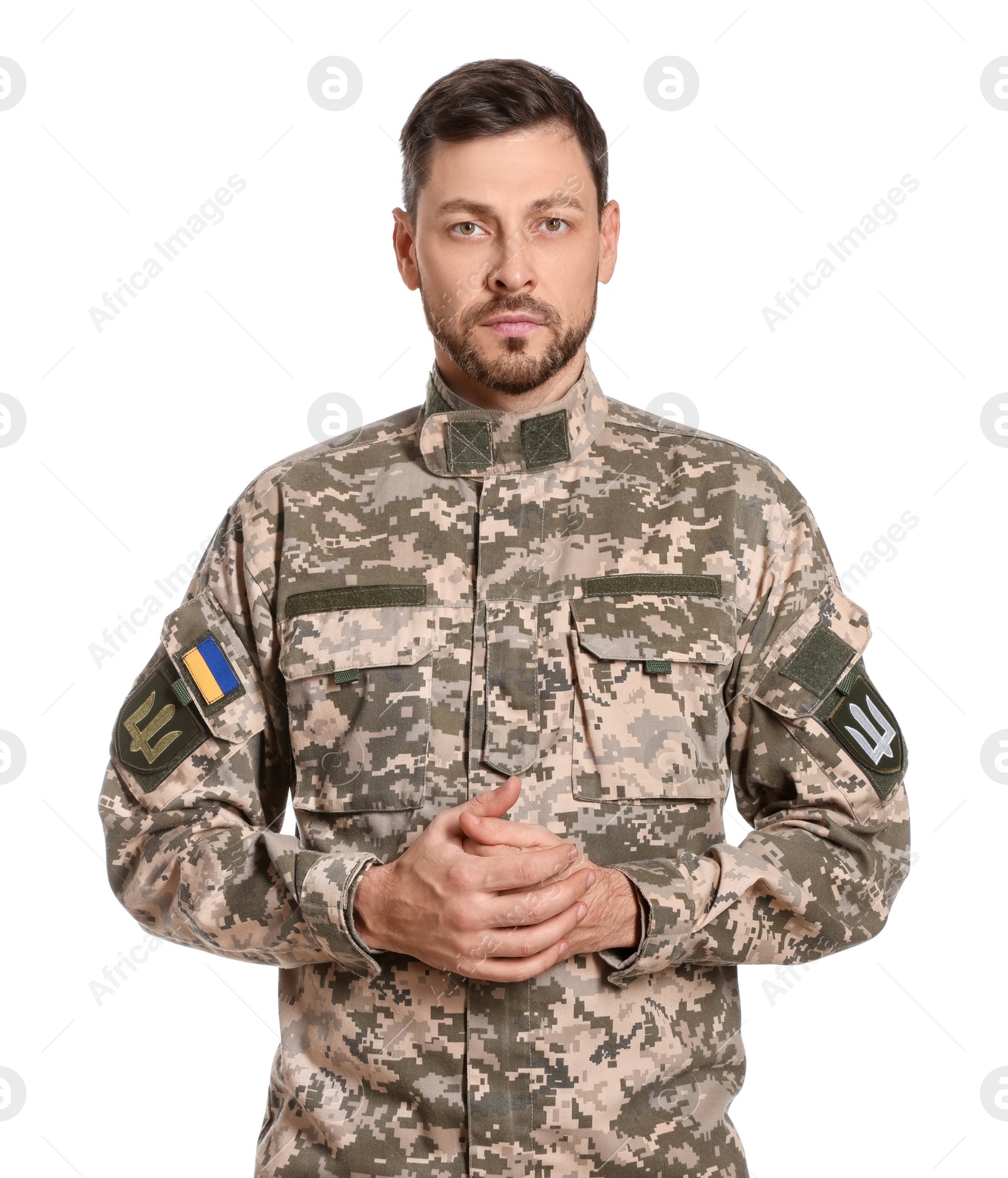 Photo of Ukrainian soldier in military uniform on white background