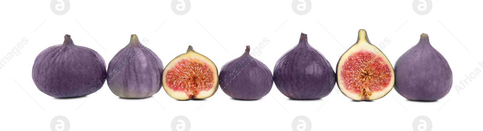 Photo of Whole and cut fresh ripe figs isolated on white