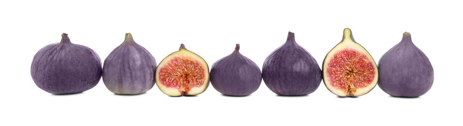 Whole and cut fresh ripe figs isolated on white