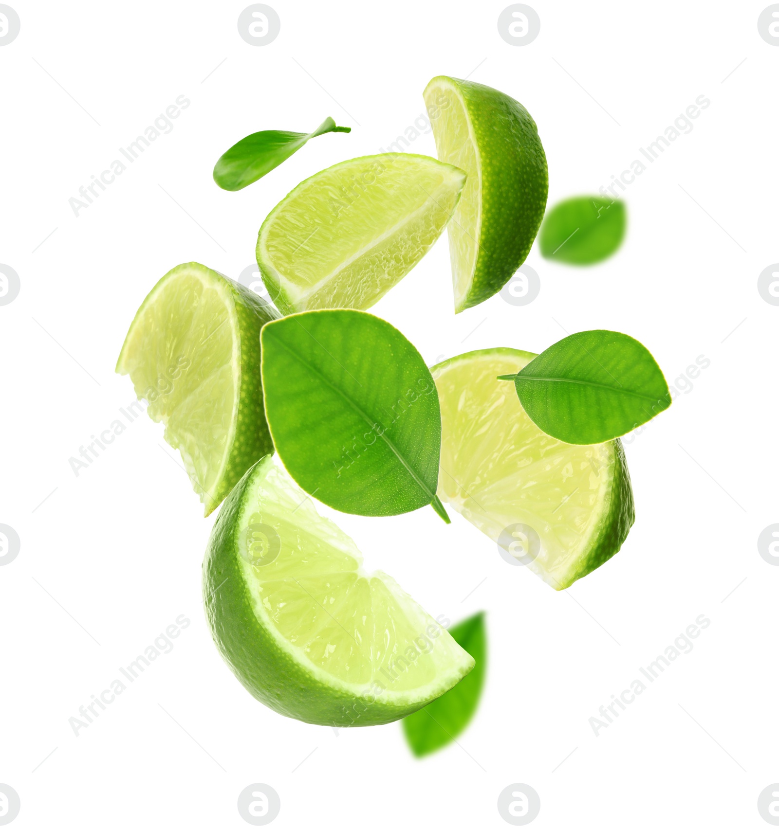 Image of Fresh lime slices and green leaves falling on white background