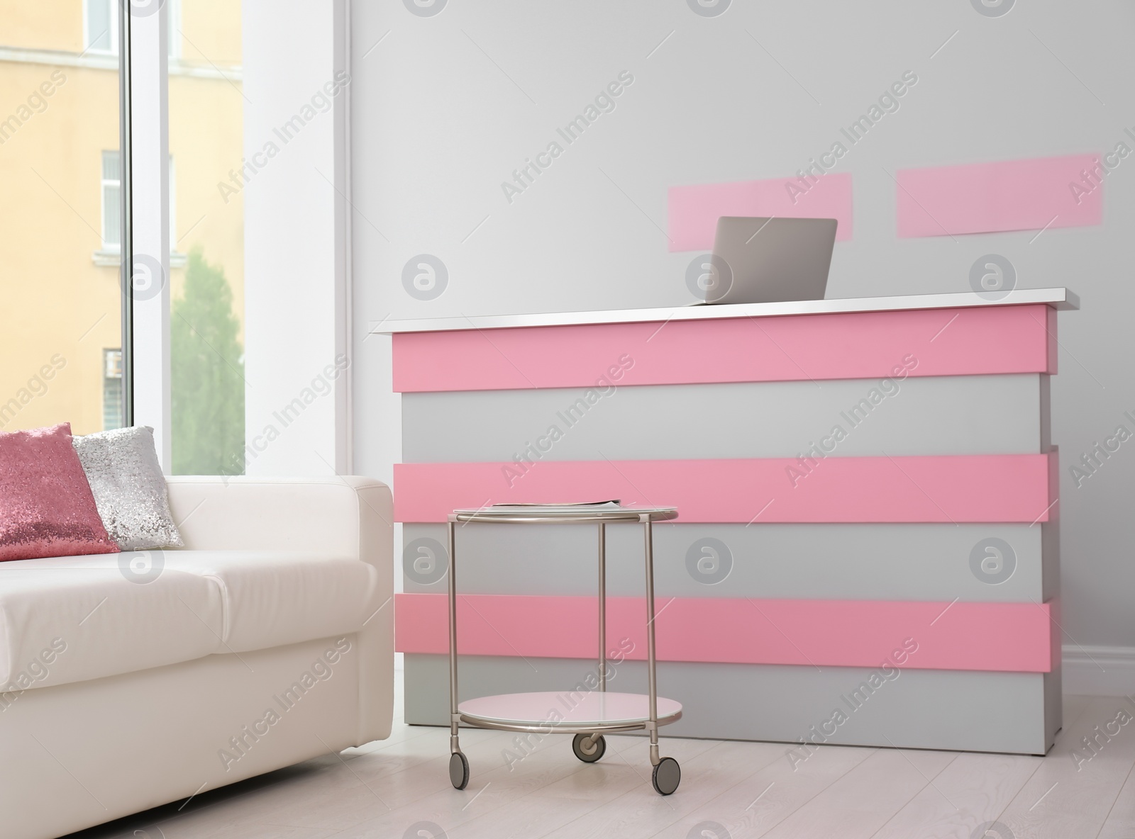 Photo of Reception desk in beauty salon. Stylish interior