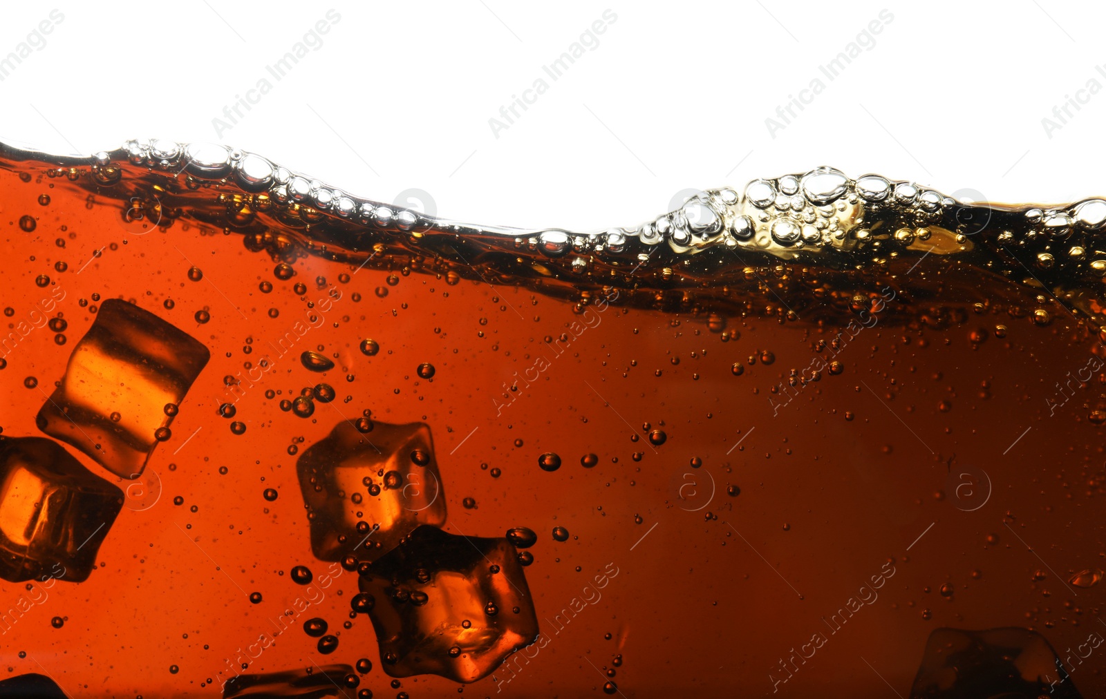 Photo of Closeup view of tasty refreshing cola with ice cubes on white background