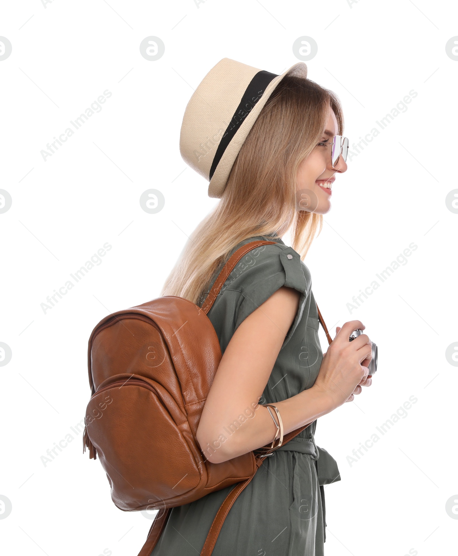 Photo of Happy woman with backpack and camera on white background. Summer travel