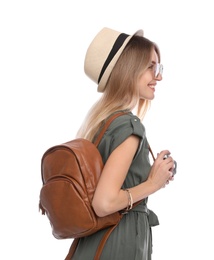 Photo of Happy woman with backpack and camera on white background. Summer travel