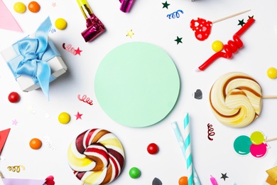 Photo of Flat lay composition with birthday party items on light background