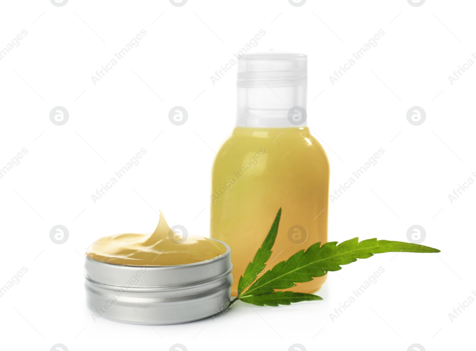 Photo of Bottle and jar with hemp lotion on white background