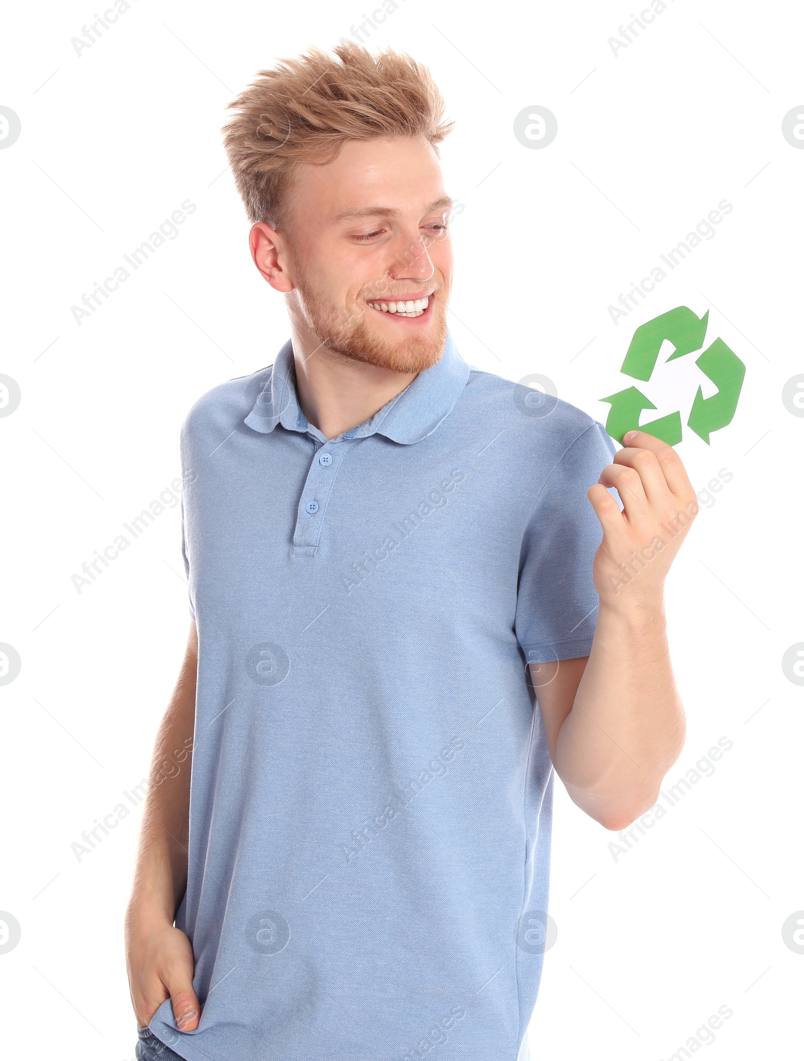 Photo of Young man with recycling symbol on white background