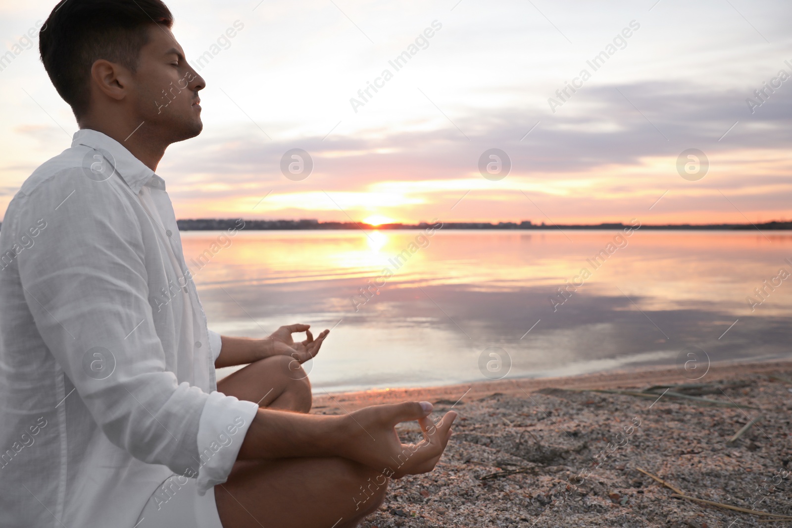 Photo of Man near river at sunset, space for text. Nature healing power