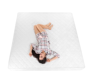 Photo of Young woman sleeping on mattress against white background, above view