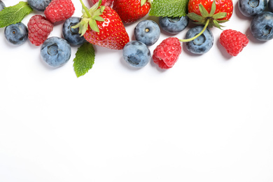 Photo of Mix of fresh berries on white background, flat lay