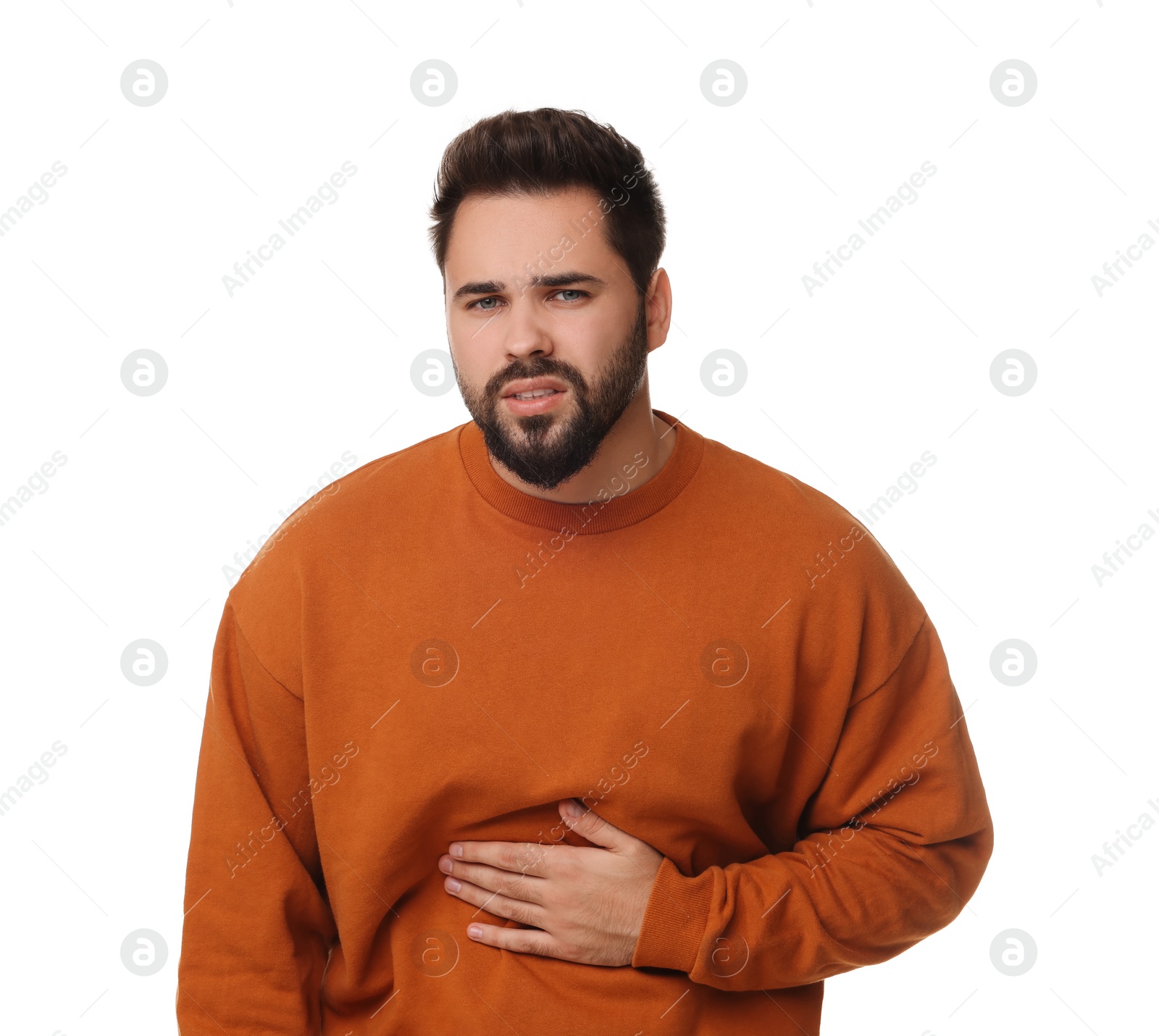 Photo of Young man suffering from stomach pain on white background