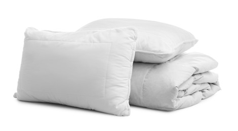 Soft blanket with pillows on white background