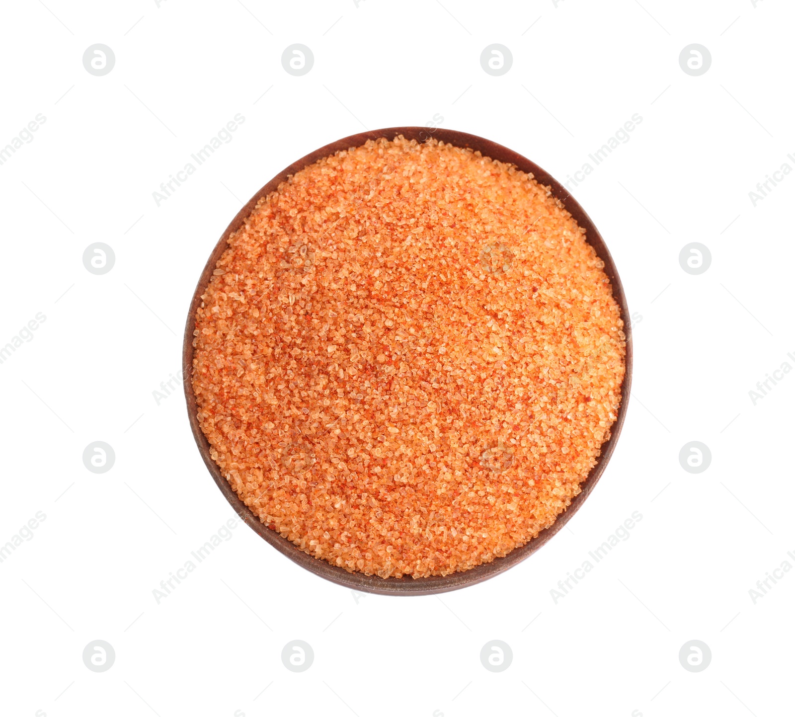 Photo of Orange salt in wooden bowl isolated on white, top view