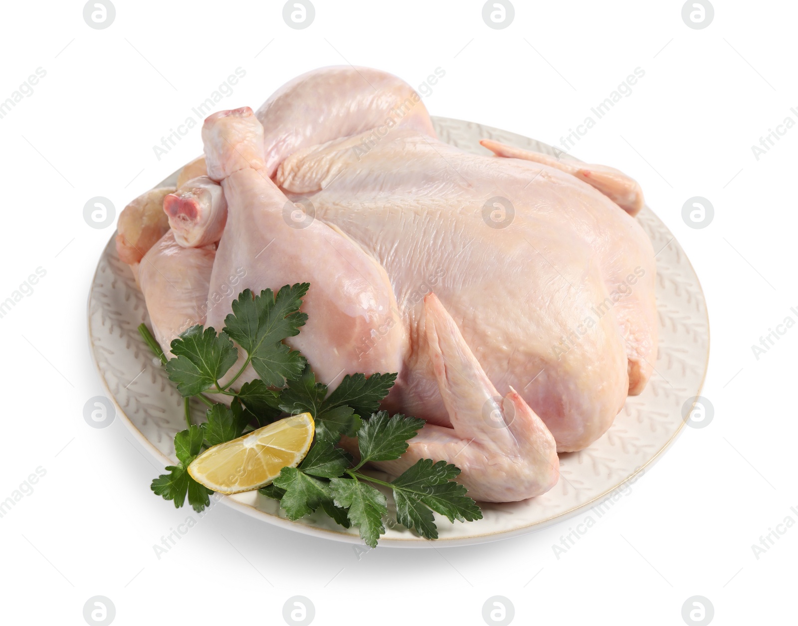 Photo of Fresh raw chicken with lemon and parsley isolated on white