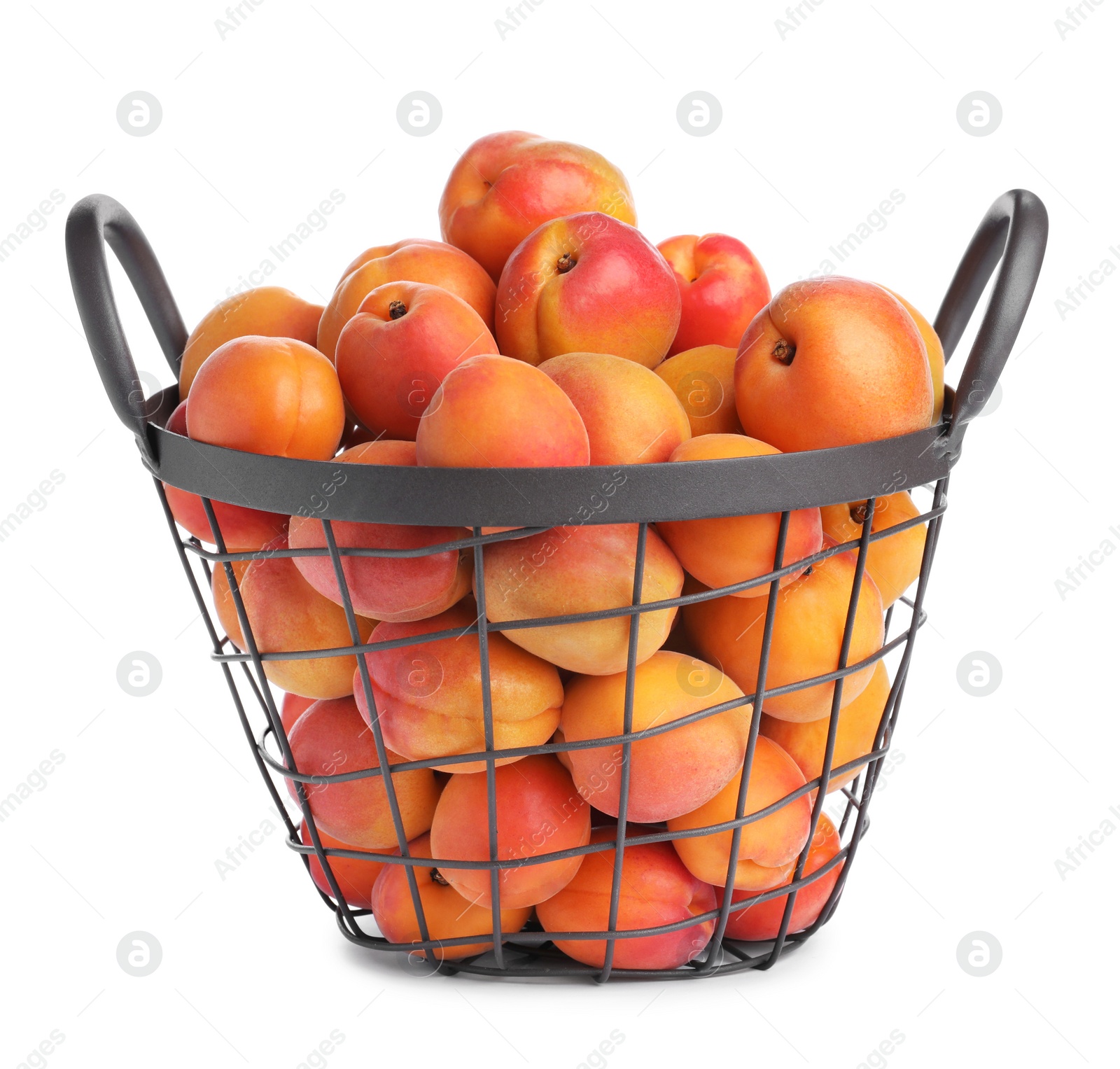 Photo of Delicious ripe apricots in metal basket isolated on white