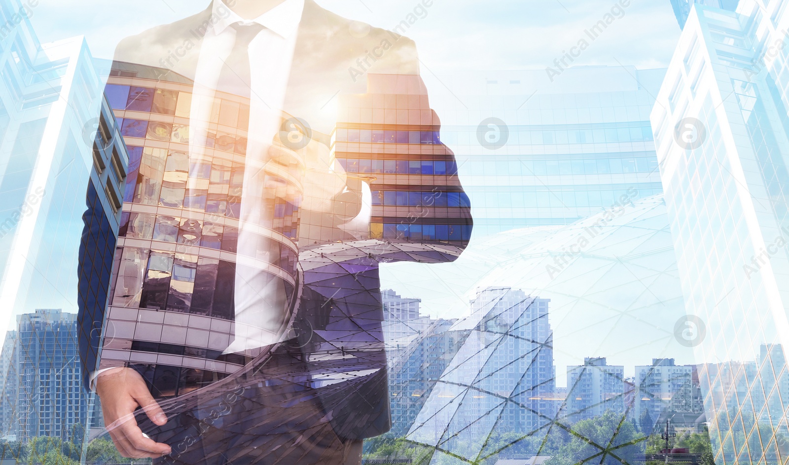 Image of Double exposure of businessman and different buildings in city