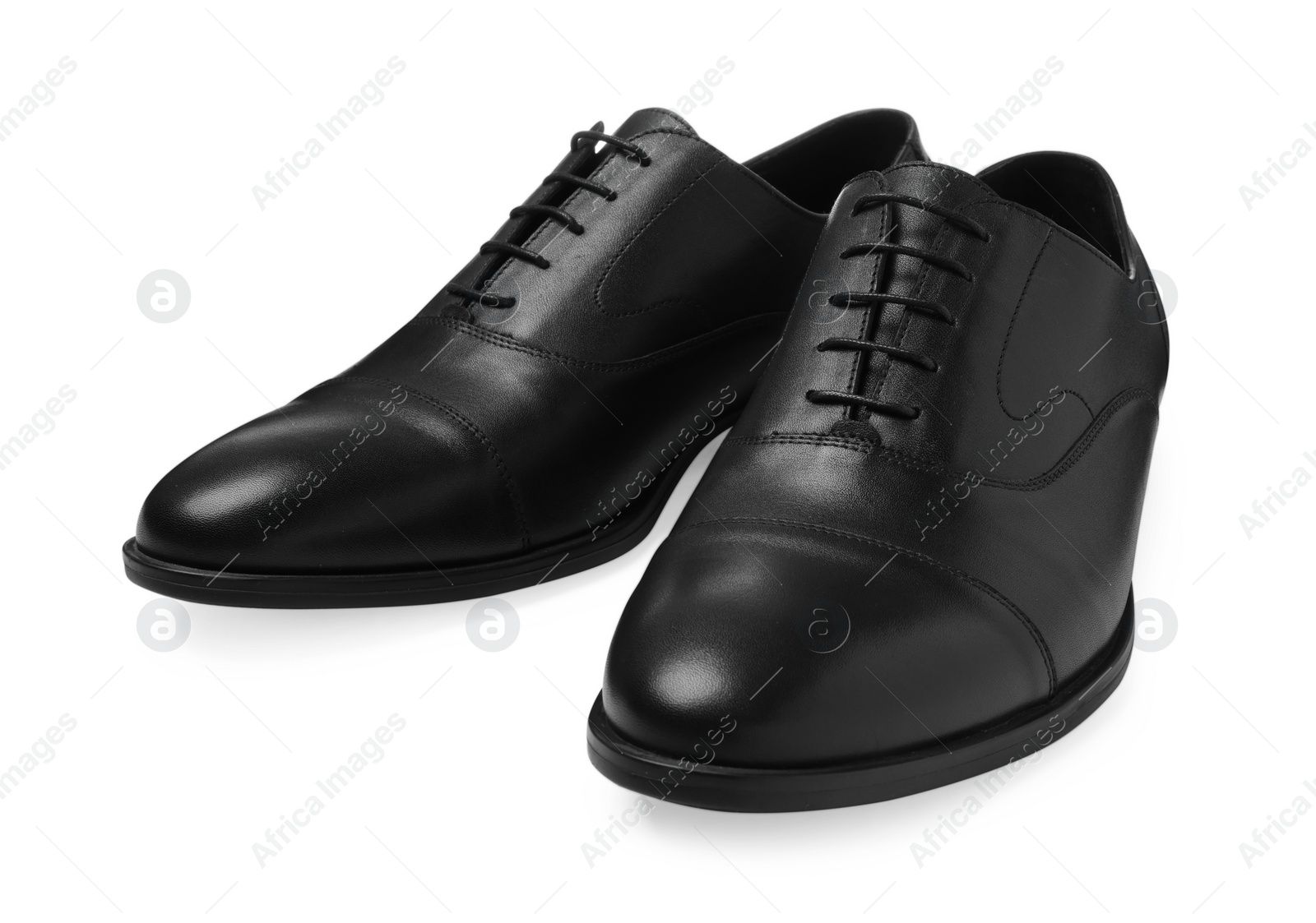 Photo of Pair of black leather men shoes isolated on white