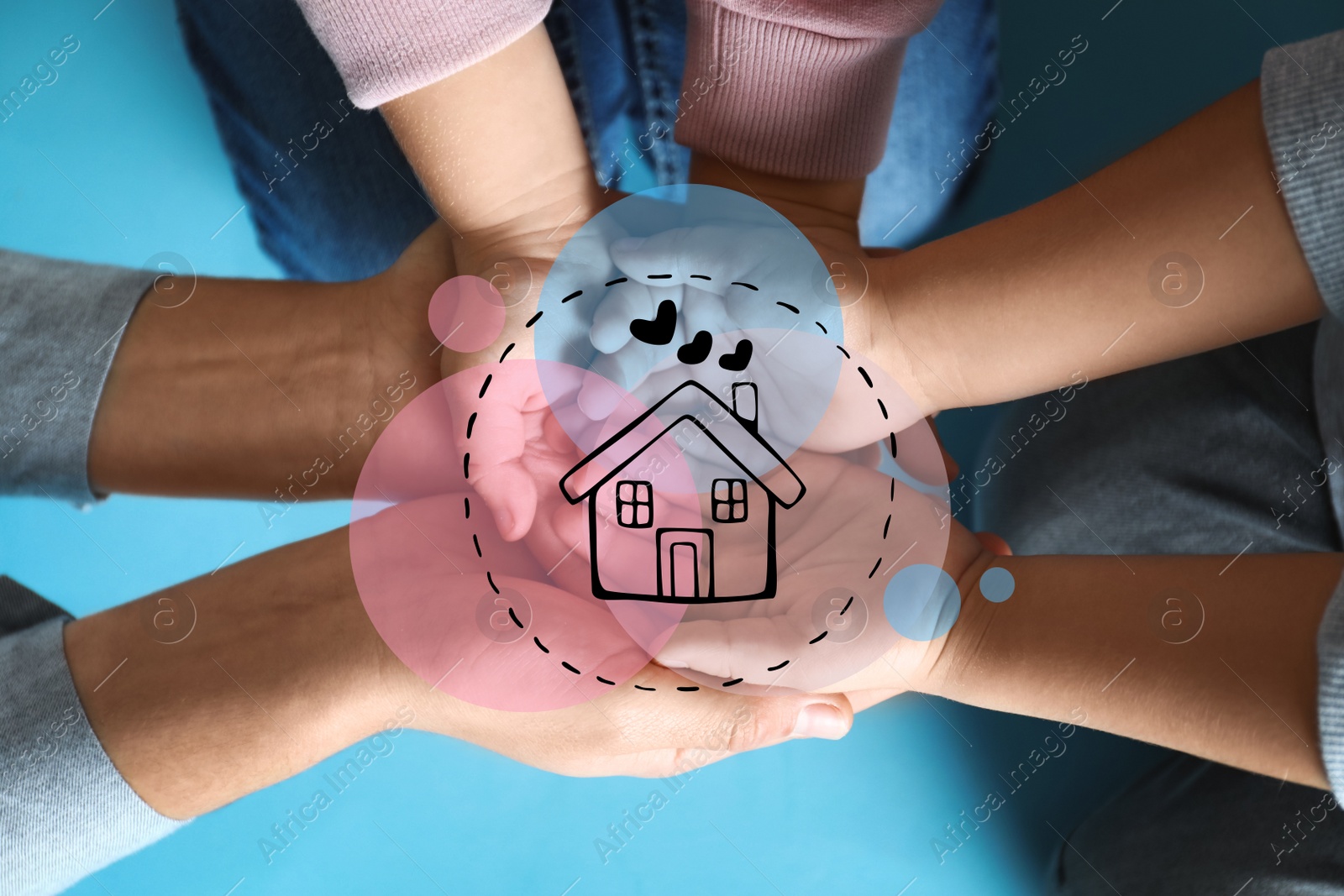 Image of Happy family holding hands and illustration of house on blue background, top view. Adoption concept