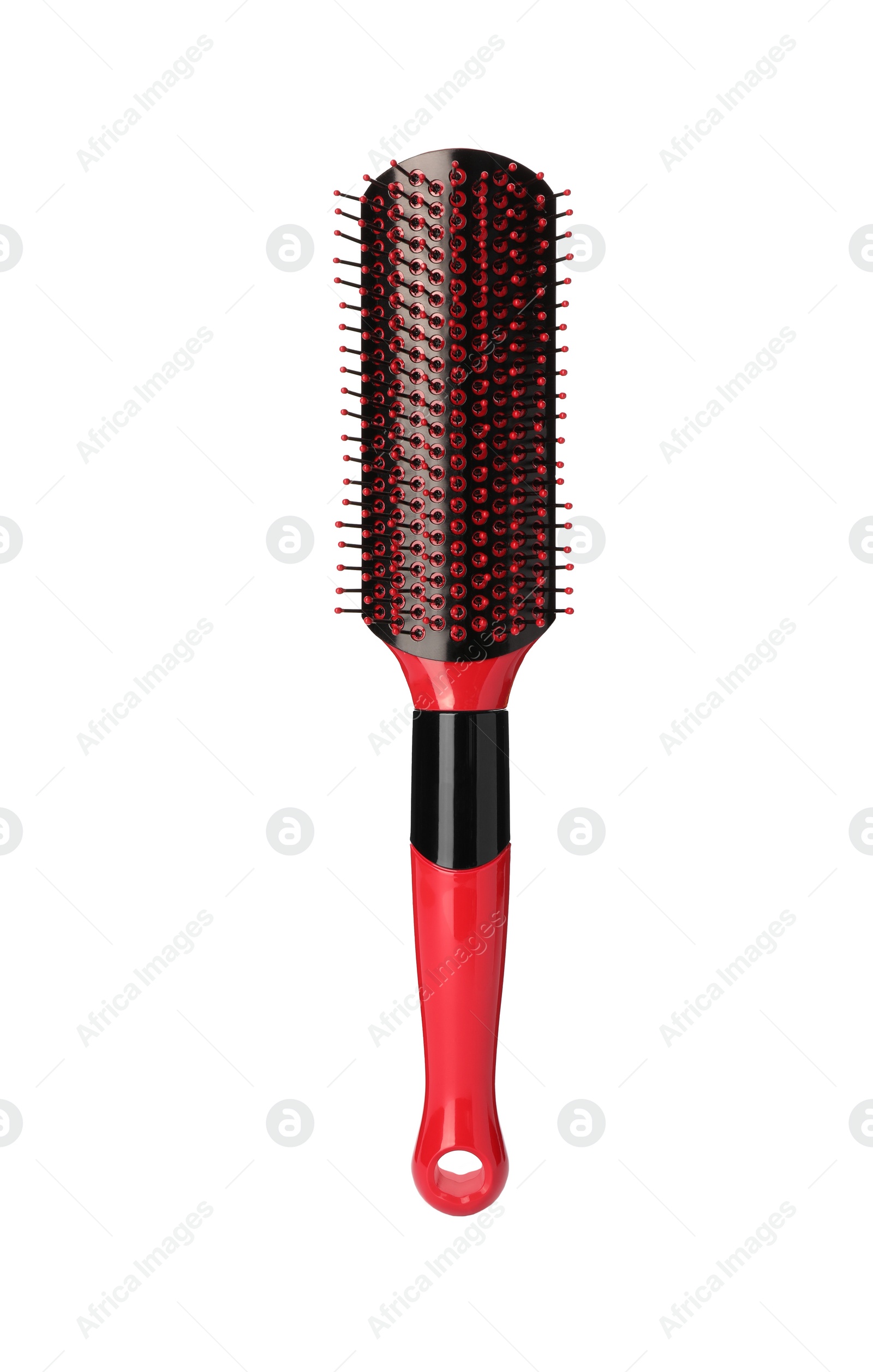 Photo of One new red hairbrush isolated on white