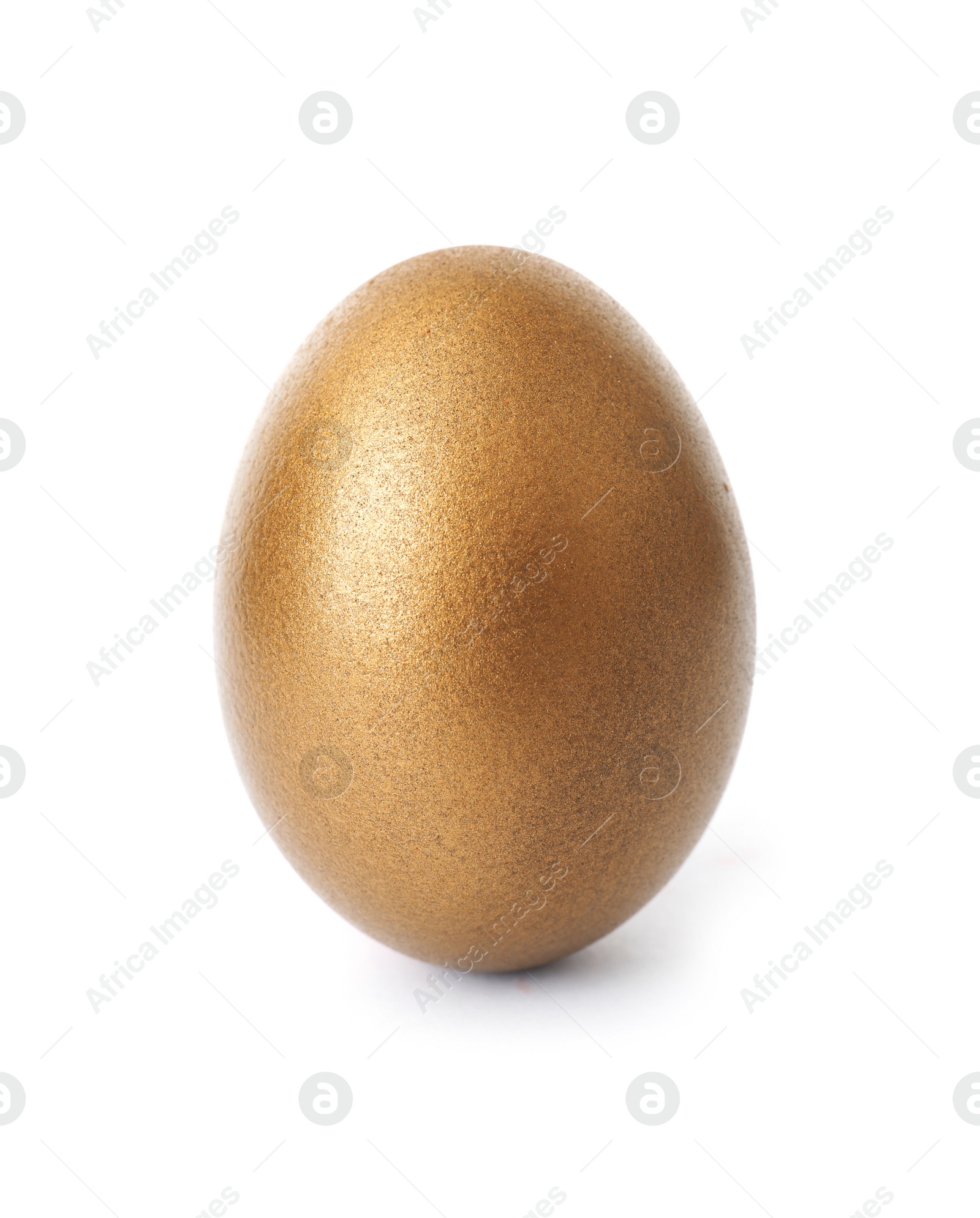 Photo of One shiny golden egg on white background