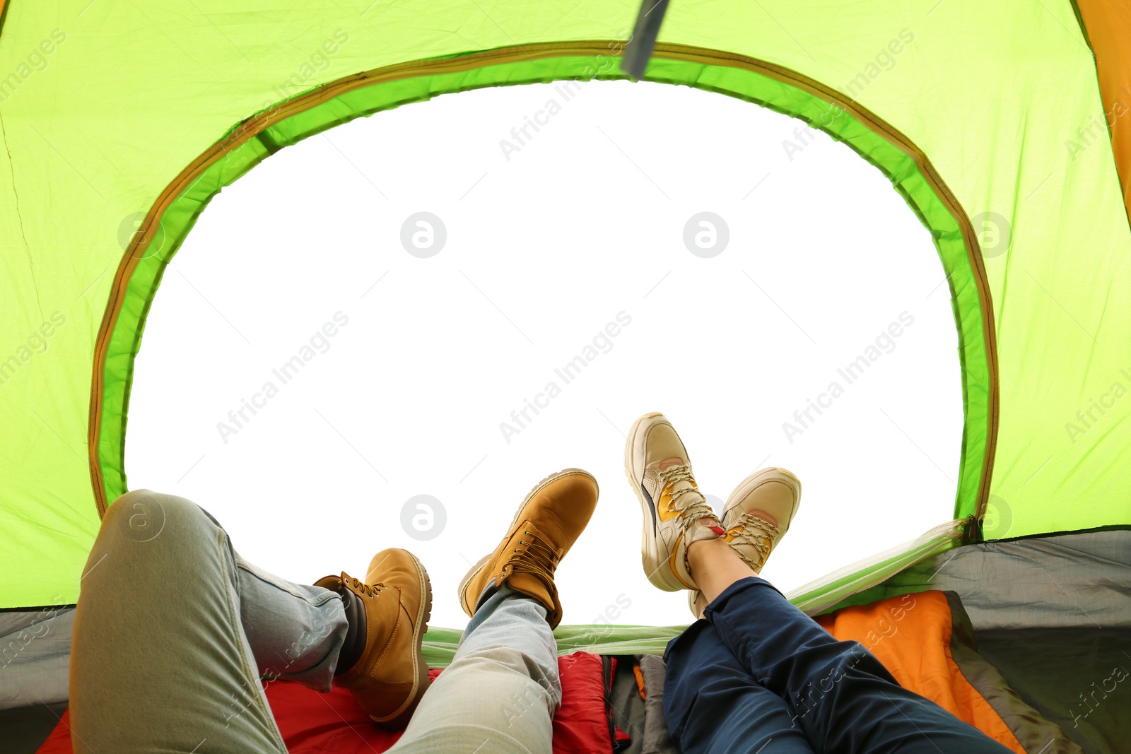 Photo of Closeup of couple in camping tent on white background, view from inside