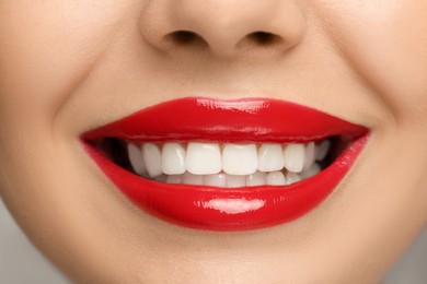 Photo of Smiling woman with healthy teeth, closeup view