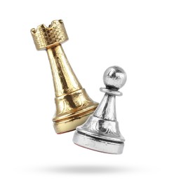 Image of Chess rook and pawn in air on white background