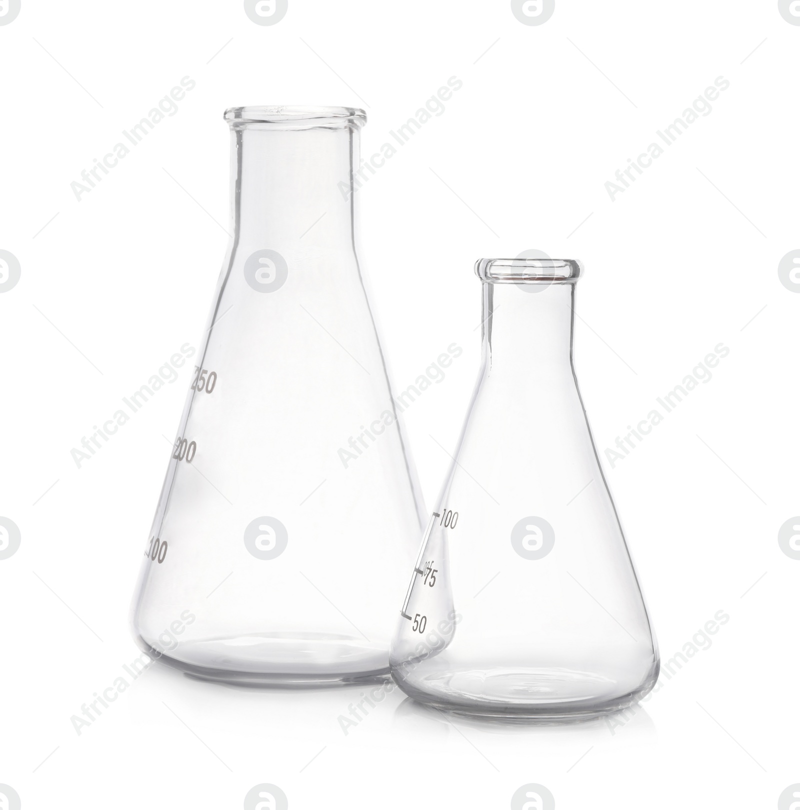 Photo of Empty flasks on white background. Laboratory equipment