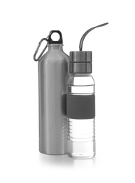 Photo of Different water bottles for sports on white background