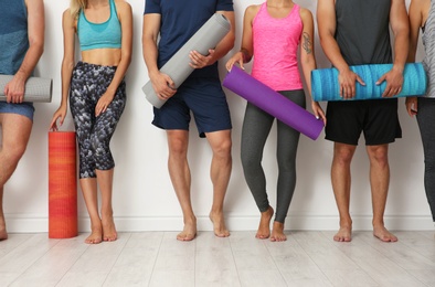 Photo of Group of young people waiting for yoga class