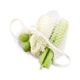 String bag with different vegetables isolated on white, top view