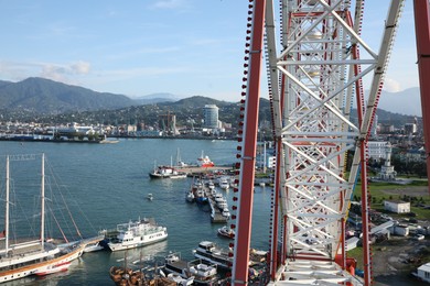 Modern city with urban architecture and port, view from tower