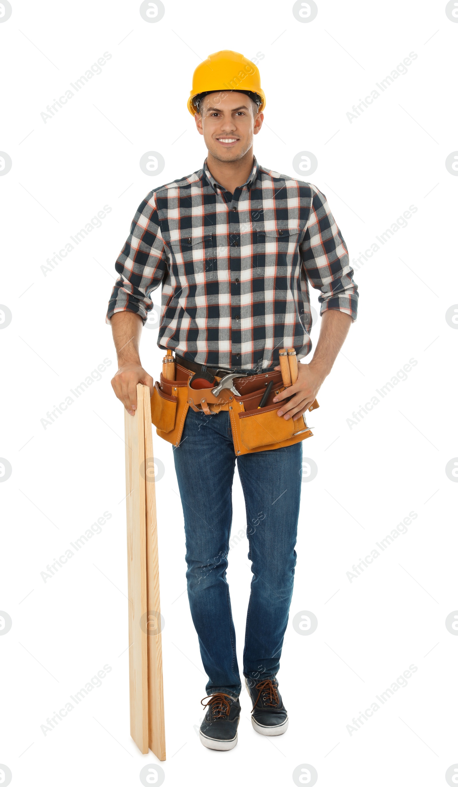 Photo of Handsome carpenter with wooden planks isolated on white