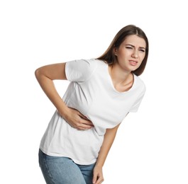 Young woman suffering from liver pain on white background