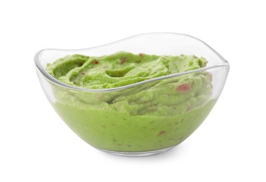 Photo of Bowl of delicious guacamole isolated on white