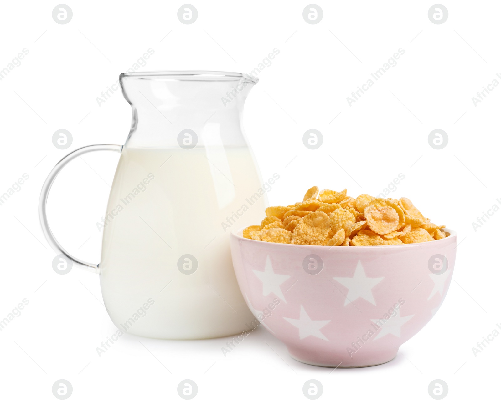 Photo of Bowl with crispy cornflakes and jug of milk on white background