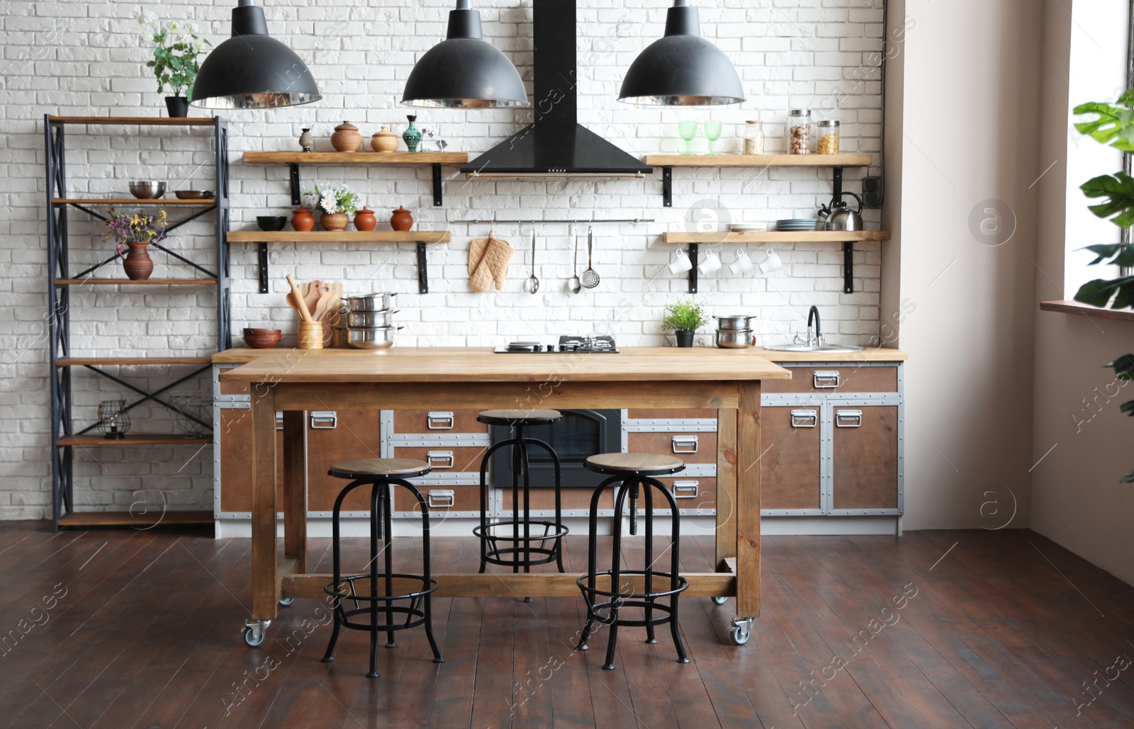 Photo of Beautiful kitchen interior with new stylish furniture