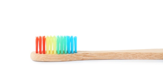 Photo of Bamboo toothbrush on white background. Dental care