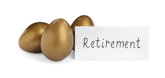 Photo of Many golden eggs and card with word Retirement on white background. Pension concept