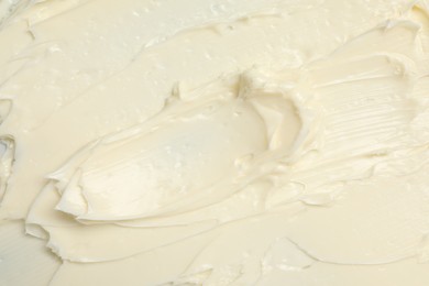 Photo of Texture of tasty butter as background, top view