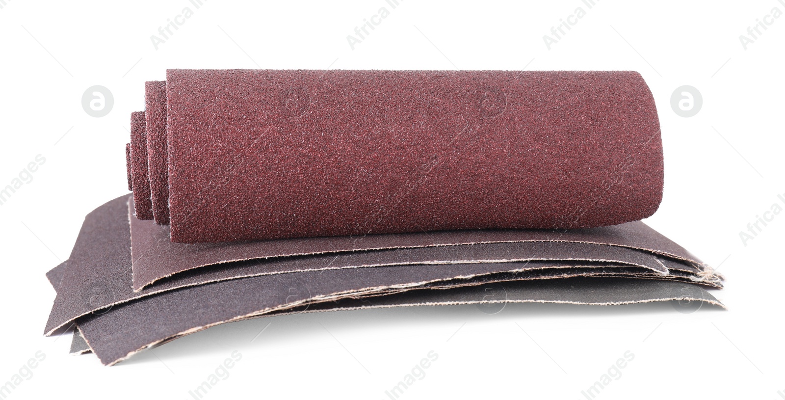 Photo of Many sheets of sandpaper isolated on white