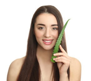 Young woman with aloe vera leaf on white background