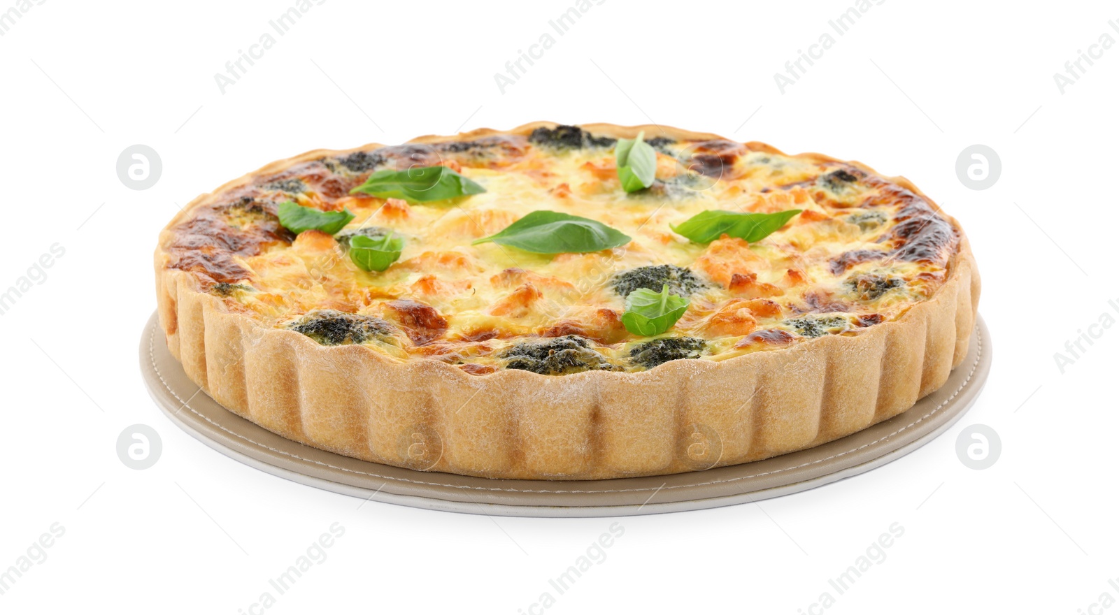 Photo of Delicious homemade quiche with salmon, broccoli and basil leaves isolated on white