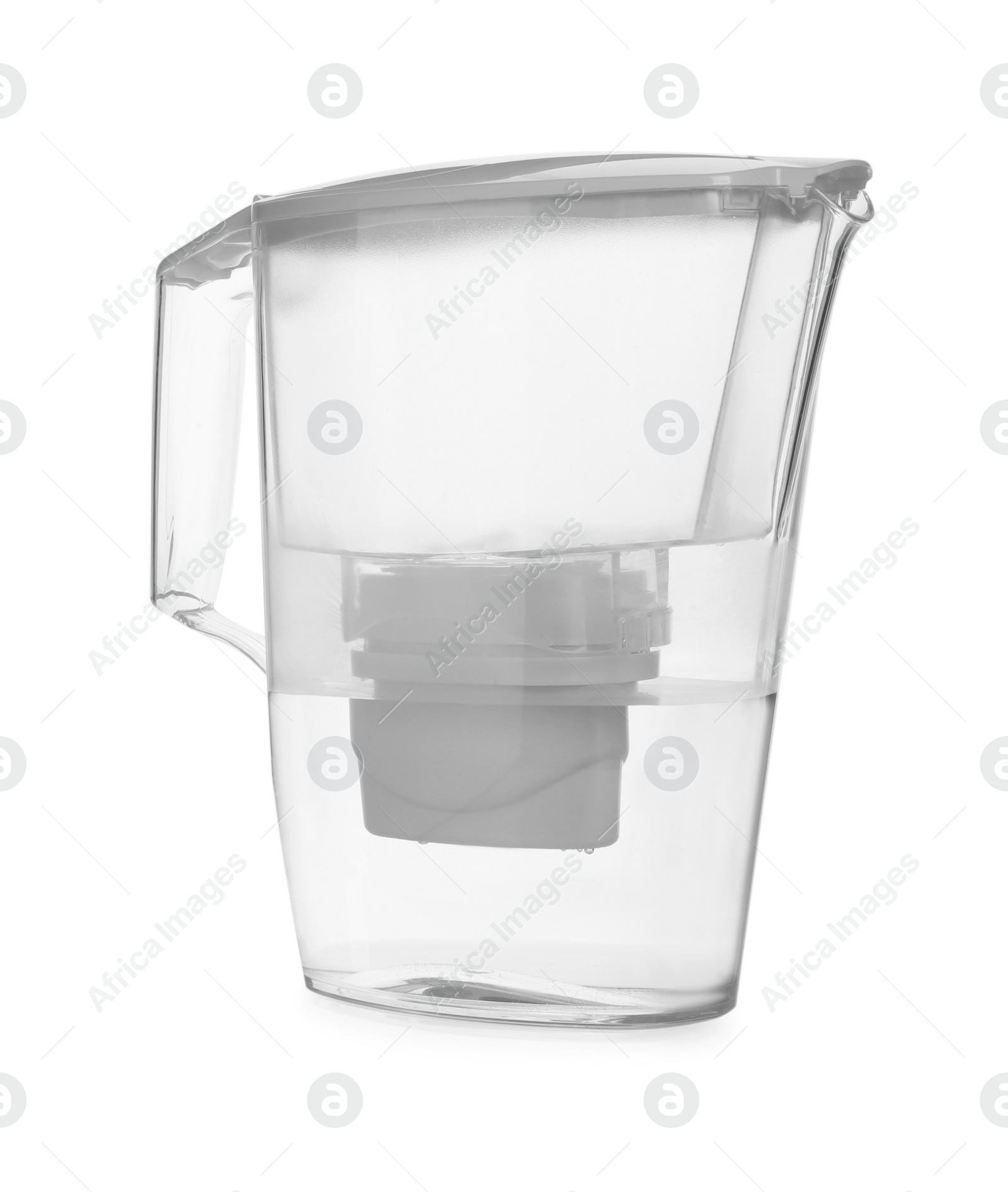 Photo of Filter jug with purified water isolated on white