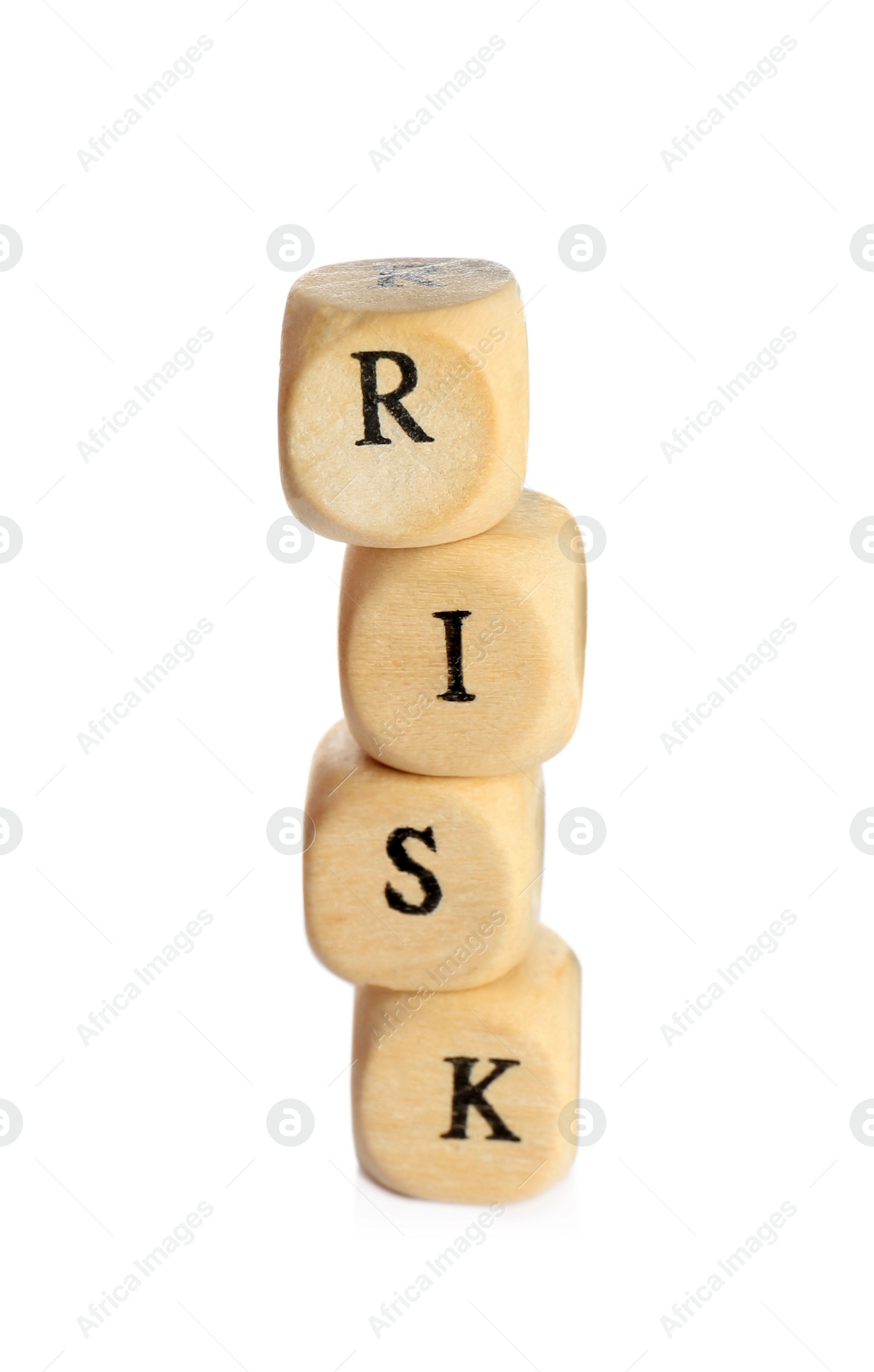 Photo of Stack of wooden cubes with word Risk isolated on white