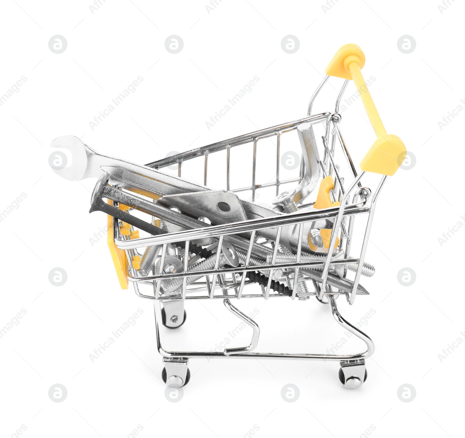 Photo of Different construction tools in shopping cart isolated on white