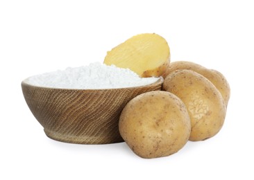 Photo of Wooden bowl with starch and fresh potatoes on white background