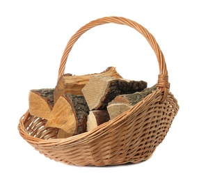 Wicker basket with firewood on white background