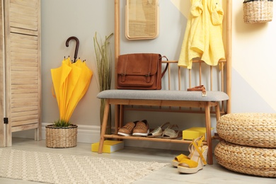 Photo of Cozy hallway interior with storage bench and stylish design elements