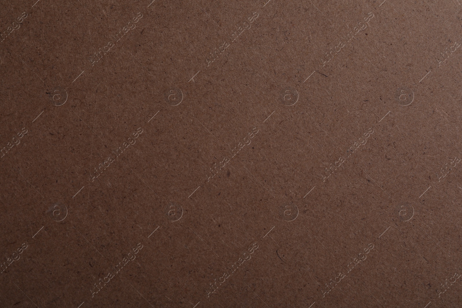 Photo of Texture of kraft paper bag as background, closeup